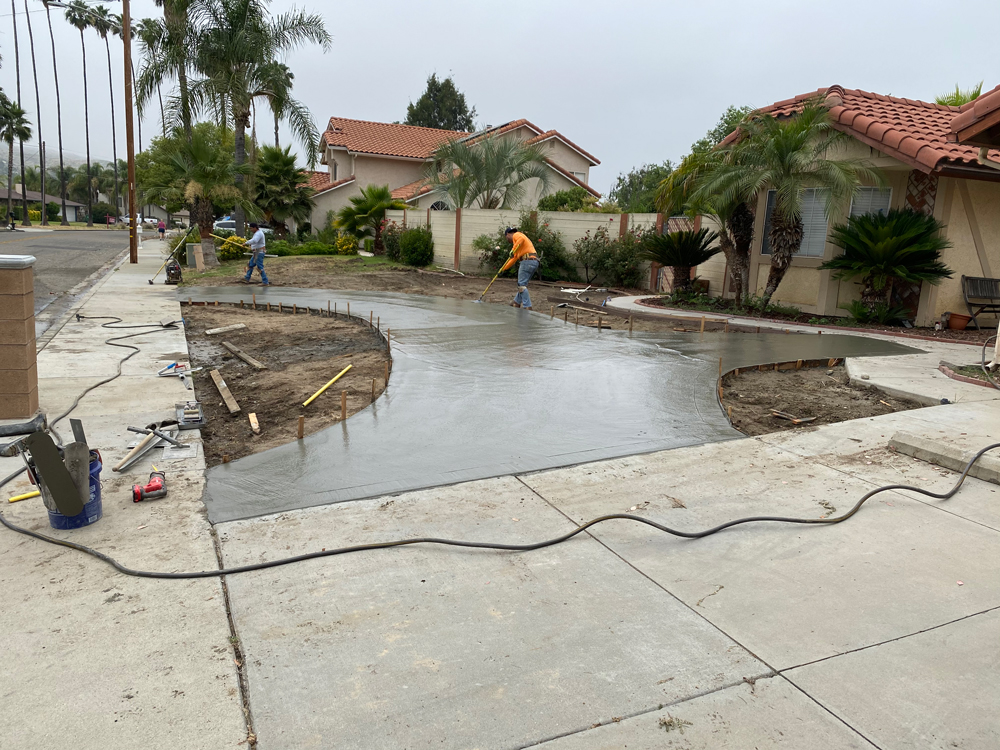 Concrete poured on newly designed Driveway Entry